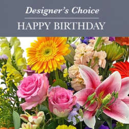 Mixed bouquet with pink roses, lilies, and a yellow gerbera daisy