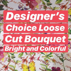 Floral-patterned wrapping paper with bold text reading Designer's Choice Loose Cut Bouquet
