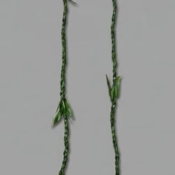 Braided green floral garland with small leaf accents on a gray background
