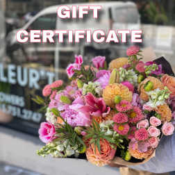 Gift certificate over a bouquet of pink and peach flowers