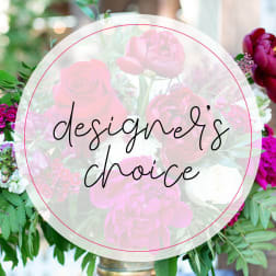 Pink and white floral arrangement with roses and peonies