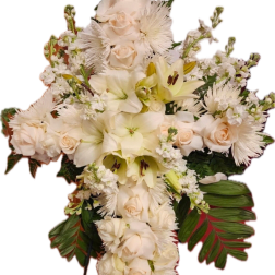 White floral cross arrangement with roses and lilies