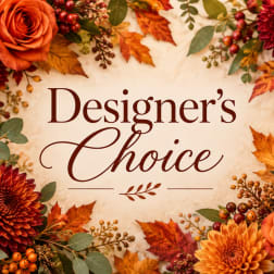 Fall floral design with orange roses and chrysanthemums around the words "Designer’s Choice"