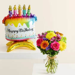 Birthday balloon with a colorful flower bouquet in a glass vase