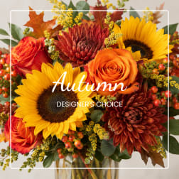 Autumn bouquet with sunflowers, orange roses, and burgundy mums