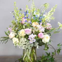 Mixed pastel bouquet in a clear glass vase
