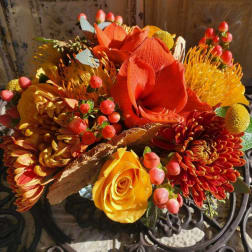 Orange and yellow bouquet with roses and mums