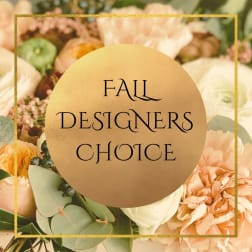 Fall floral arrangement with cream and peach blooms and a gold text overlay