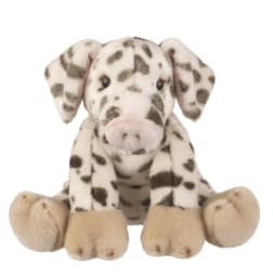 Plush spotted dog toy sitting on a white background