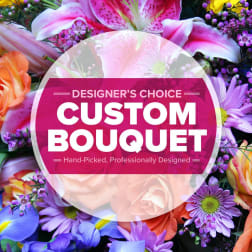 Colorful bouquet with lilies, roses, and purple daisies