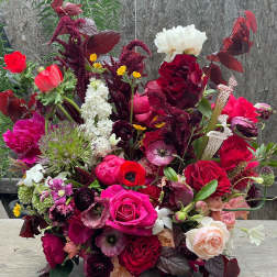 Large mixed bouquet with red, pink, white, and burgundy flowers