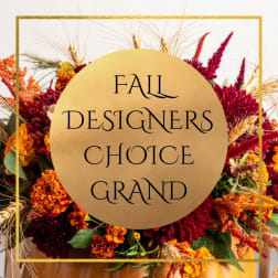 Fall floral arrangement with orange and burgundy blooms and a gold text overlay
