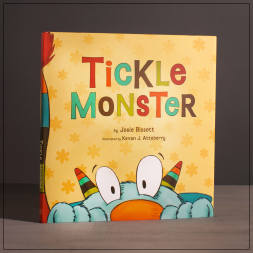 Children's book titled "Tickle Monster" with a cartoon monster on the cover