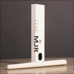 White rechargeable lighter in a box with the lighter laid in front