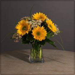 Sunflower bouquet in a clear glass vase