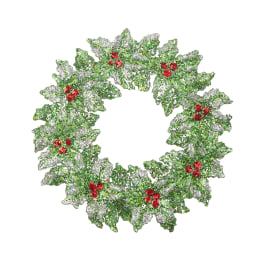 Sparkly holiday wreath with green leaves and red berries