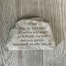 Engraved memorial stone with a message for Mom
