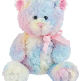 Pastel rainbow teddy bear with a pink ribbon