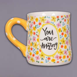 Floral-patterned mug with the words "You are Amazing"