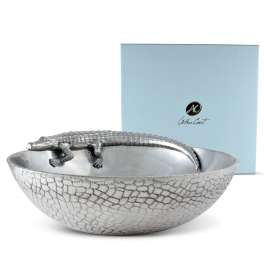 Silver bowl with a crocodile figurine on top