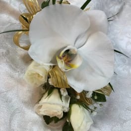 White orchid and rose bouquet with gold ribbon accents