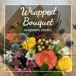 Wrapped bouquet with yellow roses, orange gerberas, and purple flowers