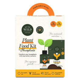 Plant food kit box with orange handle and houseplant graphics