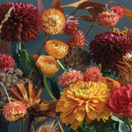Mixed bouquet of chrysanthemums and ranunculus in warm autumn colors