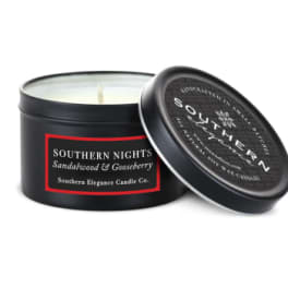 Black candle tin with lid labeled Southern Nights