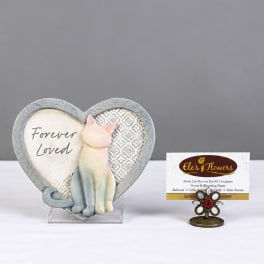 Heart-shaped memorial plaque with a cat and the words Forever Loved