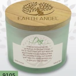 Green candle in a glass jar with a wooden lid and dog label