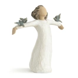 Wooden angel figurine with outstretched arms and small bird accents