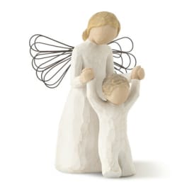 Two angel figurines in white robes with wire wings