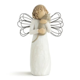 Angel figurine holding a small bird