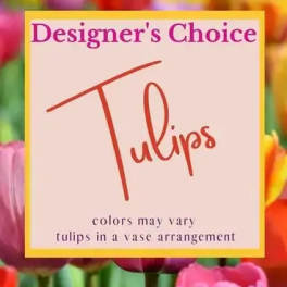 Designer’s Choice tulips sign over a blurred tulip background