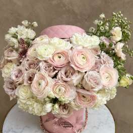 Pink and white bouquet in a quilted pink hatbox