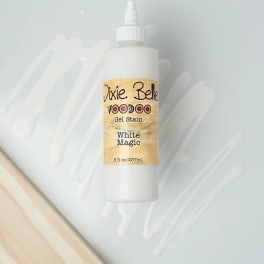 White bottle of Dixie Belle Voodoo Gel Stain labeled White Magic