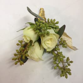 Small white rose boutonniere with green foliage and gold ribbon