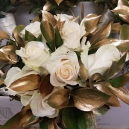 White rose bouquet with metallic gold leaves