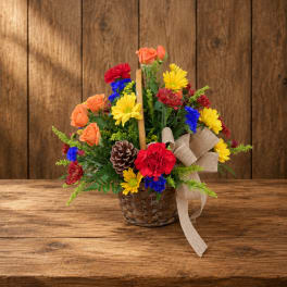 Colorful flower basket with roses, daisies, and a burlap bow
