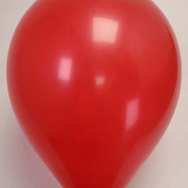 Red helium balloon on a plain background