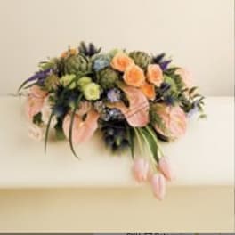 Mixed bouquet with peach, pink, and purple flowers