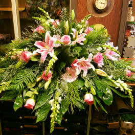 Large pink and white floral spray with lilies and roses