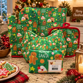 Three green Christmas tote bags with gingerbread and Santa prints