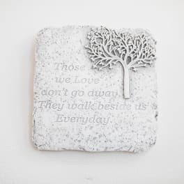 Decorative wall plaque with a tree and memorial quote