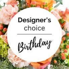 Birthday floral arrangement with pink and orange blooms