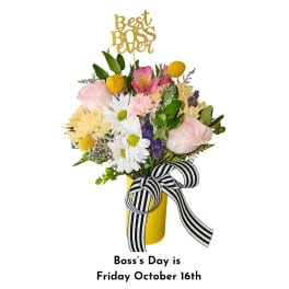 Mixed bouquet in a yellow vase with a striped ribbon and Boss Day topper