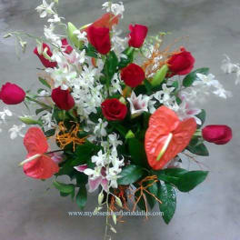Bouquet of red roses, white orchids, and red anthuriums