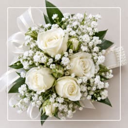 White rose bouquet with baby's breath and ribbon