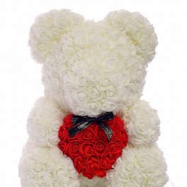 White rose teddy bear holding a red rose heart